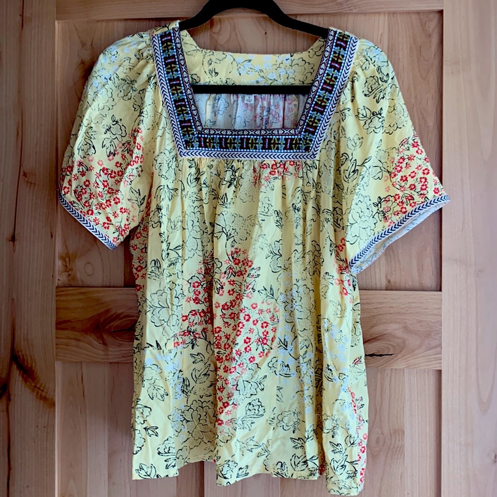 Embroidered blouse.